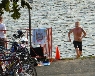 Photo of the 1st guy out of the water at the Midwest Mayhem Triathlon at Lone Star Lake.