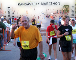 Photo of Mike Wildgen at finish of KC Half Marathon.