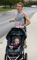 Photo of Matt Batzel finishing the Race Ipsa 5K.