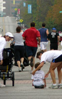 Consoling a fallen runner.