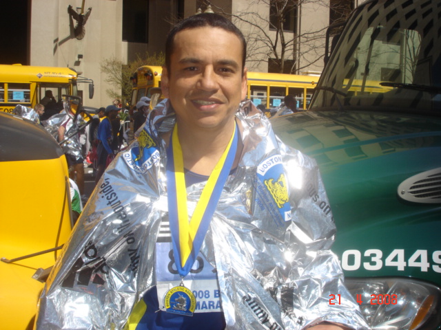 Jorge wrapped in a space blanket.