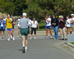 Fred Van Vleck is cheered in at the finish.