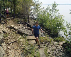 Photo of Levi Bowles on the Shoreline Shuffle course at Clinton Lake.