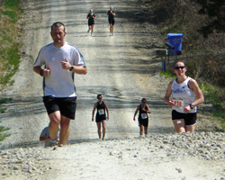 Photo of runners approaching station number 9.