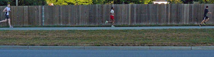Deanna Rose Farmstead 5K - running along the Switzer Road fence.