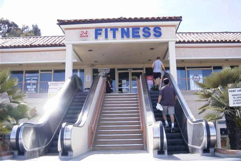 Photo of Point Loma Fitness Center with entrance with steps and outdoor escalator.