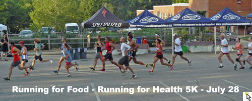 Photo of the start of the Merc 5K going by the West Middle School garden.