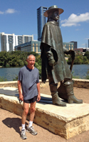 Photo of John Huchingson in Austin with Stevie Ray Vaughn.