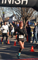 Emily Venters, 1st overall female at the runLawrence Thanksgiving Day 5K.